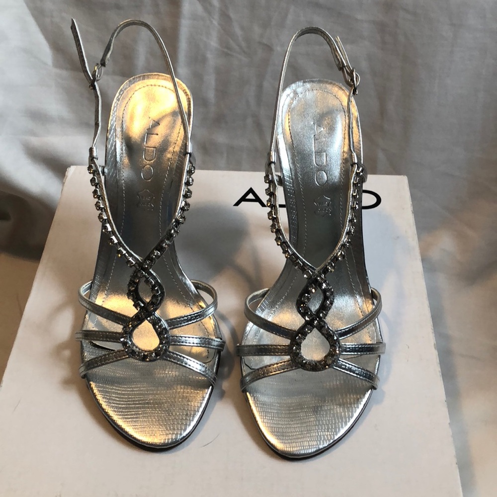 Like new silver stilettos
